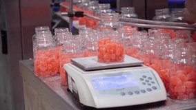 Pharmaceutical employee on testing the weight and dose of the the nutraceutical gummies on the factory - Powered by Shutterstock - Get 15% off with code: PIKWIZARD15