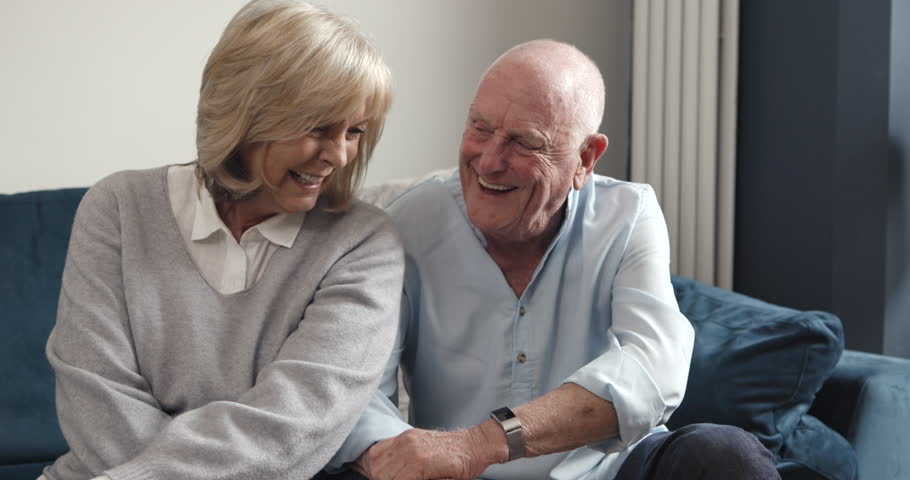 Happiness, communication and elderly couple laugh at old age joke, goofy comedy humour or silly conversation. Happy, relax and mature man, happy woman or laughing people bonding in Australia home