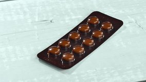 Many brown pill blister packs on the table. - Powered by Shutterstock - Get 15% off with code: PIKWIZARD15