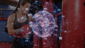 Female boxer punching heavy bag in gym, showing fitness tech with holographic globe and code. Athlete, fitness, digital, innovation, determination, strength, modern - Powered by Shutterstock - Get 15% off with code: PIKWIZARD15
