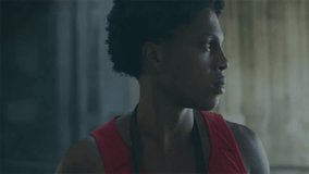 man wearing red tank top interacting with floating progress bars and numbers for technology. Technology, innovation, futurism, digital, interface, modern, data visualization - Powered by Shutterstock - Get 15% off with code: PIKWIZARD15