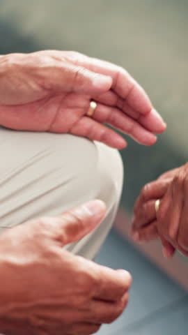 Holding hands, old couple and support with love, comfort and compassion with relationship. Closeup, people and man with woman, home and kindness with empathy, retirement and marriage with care