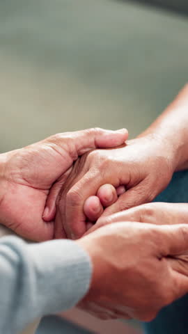 Holding hands, old couple and support with love, comfort and compassion with relationship. Closeup, people and man with woman, home and kindness with empathy, retirement and marriage with care