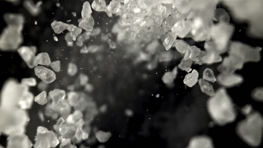 Salt falls down. Filmed on a high-speed camera at 1000 fps. High quality FullHD footage