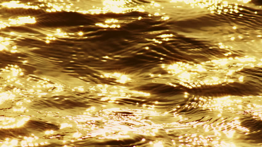 Dramatic sea sunrise or sunset sky over sea, Burning sky and shining golden waves landscape background,Beautiful waves High quality video ProRes