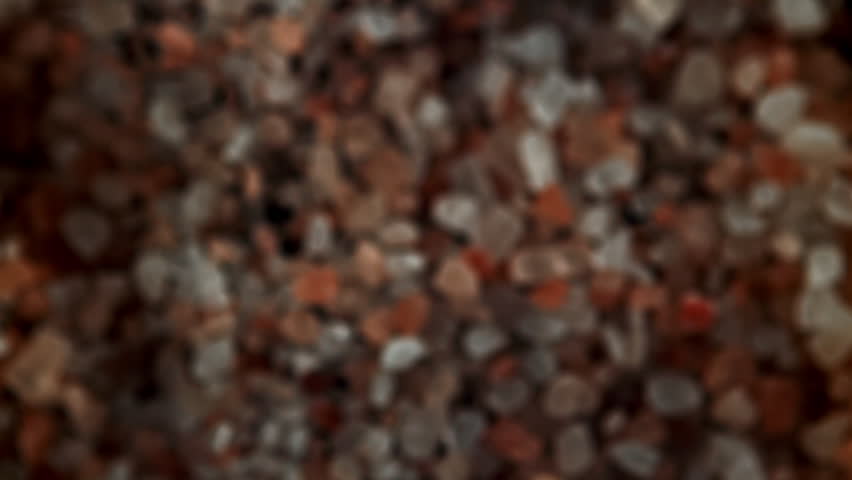 The pink salt flies up and down. Filmed on a high-speed camera at 1000 fps. High quality FullHD footage