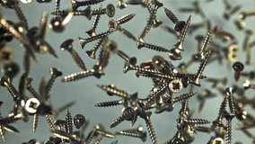Self-tapping screws fly up and fall down. Filmed on a high-speed camera at 1000 fps. High quality FullHD footage - Powered by Shutterstock - Get 15% off with code: PIKWIZARD15