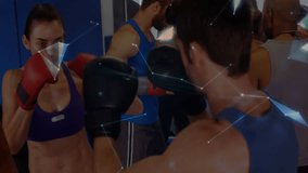 Female boxer throwing punch at focus pads in fitness training gym, featuring digital globe overlay. Athletes, strength, determination, modern, innovation, fitness, competition - Powered by Shutterstock - Get 15% off with code: PIKWIZARD15