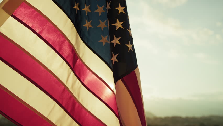 American Flag Symbol Of Patriotism Standing With Sunrise Sky Background