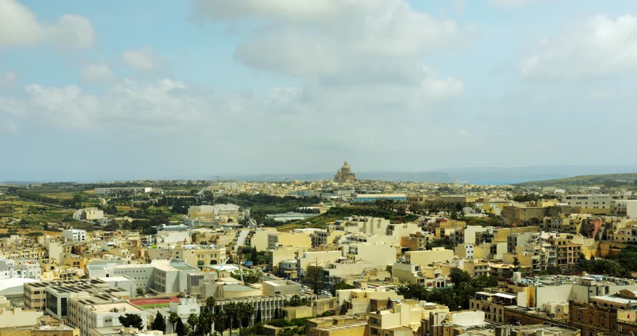Malta city of Victoria contains small buildings and attracts tourists with sights. Ferries provide transportation for travelers to island of Gozo