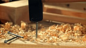 The carpenter hammers a nail into the board. Filmed on a high-speed camera at 1000 fps. High quality FullHD footage - Powered by Shutterstock - Get 15% off with code: PIKWIZARD15