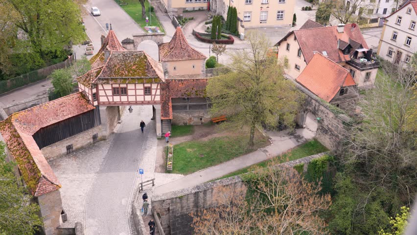 25.04.2025 Rothenburg Ob der Tauber Bavaria, Middle Franconia in Germany. German traditional architecture half-timbered houses in historical center Rothenburg ob der Tauber. Travel, tourism concept.
