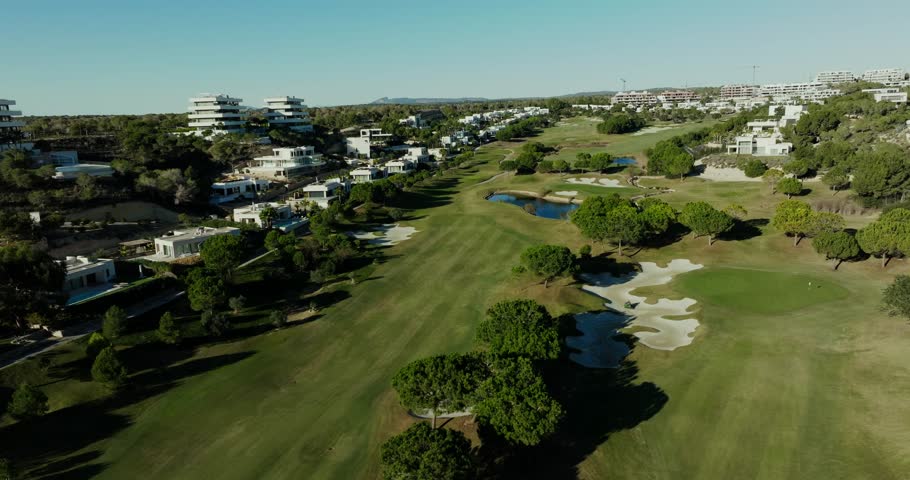 Luxury villas and premium homes surrounding a green golf course near Almeria in Southeast Spain, offering an exclusive leisure and resort lifestyle.