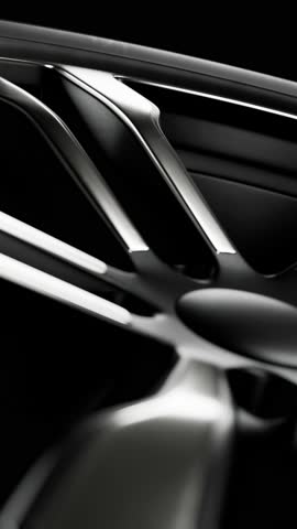 Modern Automotive Alloy Wheel Closeup. Vertical looped animation.