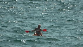 Kayaking Ocean Water Sport - Man paddling kayak on a choppy ocean. - Powered by Shutterstock - Get 15% off with code: PIKWIZARD15