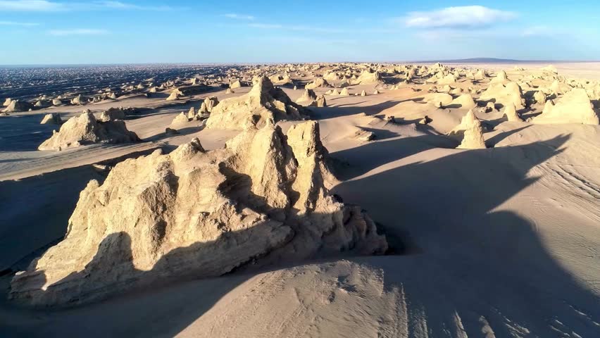 Aerial View of Desert Rock Formations at Sunset