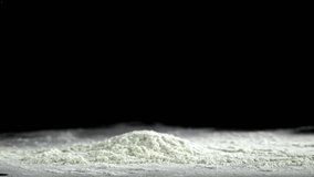 The dough falls on the table. Filmed on a high-speed camera at 1000 fps. High quality FullHD footage - Powered by Shutterstock - Get 15% off with code: PIKWIZARD15