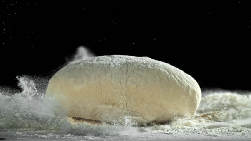 The dough falls on the table. Filmed on a high-speed camera at 1000 fps. High quality FullHD footage