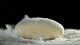 The dough falls on the table. Filmed on a high-speed camera at 1000 fps. High quality FullHD footage - Powered by Shutterstock - Get 15% off with code: PIKWIZARD15