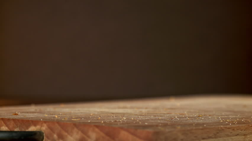 Potato chips fall on a wooden table. Filmed on a high-speed camera at 1000 fps. High quality FullHD footage