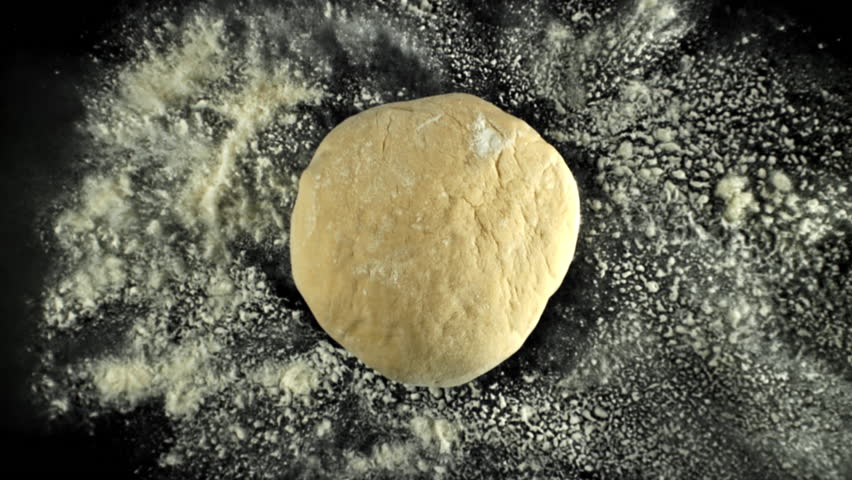 The dough flies up and falls down. Filmed on a high-speed camera at 1000 fps. High quality FullHD footage