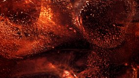 Bubbles in a glass of cola with ice. Filmed on a high-speed camera at 1000 fps. High quality FullHD footage - Powered by Shutterstock - Get 15% off with code: PIKWIZARD15