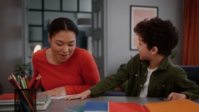 African American family home personal teacher tutor lady female girl woman help little boy with homework funny mother play fun with kid son child education study steal notebook copybook laugh talking - Powered by Shutterstock - Get 15% off with code: PIKWIZARD15