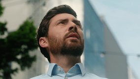 Close up Caucasian manager investor urban trader developer looking around look in sky lost in city navigation European man businessman guy male business thinking searching office company building - Powered by Shutterstock - Get 15% off with code: PIKWIZARD15