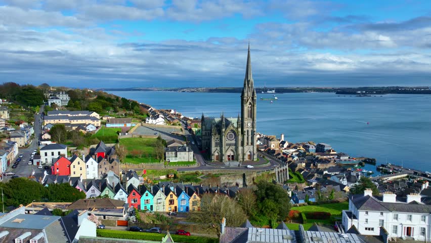 aerial view of Irish town of Cobh, Cork county, Ireland, travel and tourism in Ireland, gothic cathedral in Ireland in county Cork. High quality 4k footage