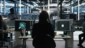 Data center engineer implements AI virtualization frameworks to optimize server clusters. Server hub IT professional doing artificial intelligence predictive analysis, camera A - Powered by Shutterstock - Get 15% off with code: PIKWIZARD15