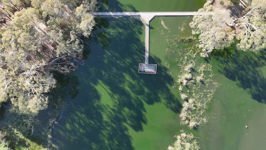 Laratinga Wetlands, Mount Barker, South Australia – 4K Aerial Drone Footage of Elevated View of Boardwalk Platform, Aquatic Plants, Wildlife, Ducks, Still Waters, and Reflections in a Natural Reserve