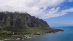 3D emoji spheres floating above hills and ocean, with headphones displaying varied expressions. Whimsical, vibrant, playful, modern, surreal, expressive, conceptual - Powered by Shutterstock - Get 15% off with code: PIKWIZARD15