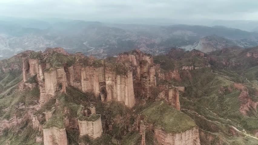 Aerial View of Dramatic Rock Formations in a Mountainous Landscape