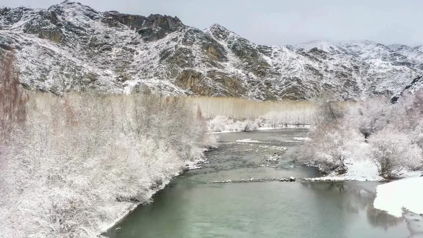 Snow-Covered Rocky Gorge Winter Landscape Aerial View