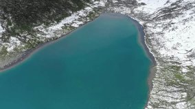 Aerial View of Turquoise Alpine Lake in Winter - Powered by Shutterstock - Get 15% off with code: PIKWIZARD15