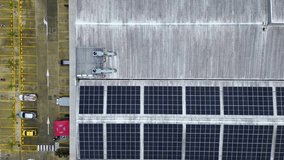 Drone Aerial View of Industrial Building with Solar Panels, Sustainable Energy Concept. High quality 4k footage - Powered by Shutterstock - Get 15% off with code: PIKWIZARD15