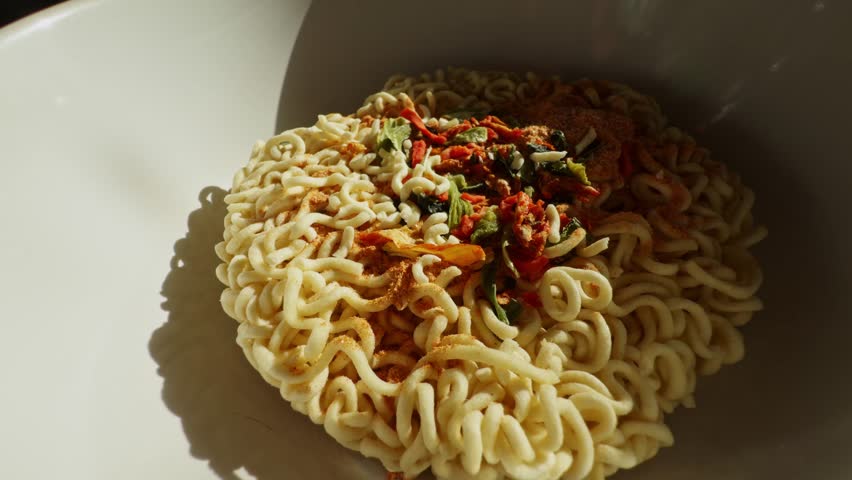 Instant Rice Noodles Bowl. Chinese Ramen Soup. Cooked Rice Instant Glass Noodles Ramyeon Bowl. Asian Dinner Cooking. Quick Ramen Dry Vegetables. Chinese Food. Korean Ramyeon Bowl Glass Noodles 