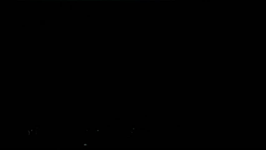 Raw chicken legs falling on black background. Filmed on a high-speed camera at 1000 fps. High quality FullHD footage