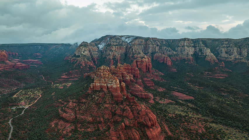 Dramatic Red Rock Formations and Lush Valleys Define the Red Rock-Secret Mountain Wilderness Near Sedona, Arizona - Drone Flying Forward