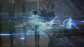 Mid-adult male holding tablet in tech lab, projecting holographic grid with floating characters. Technology, innovation, futurism, digital interface, augmented reality, data visualization, - Powered by Shutterstock - Get 15% off with code: PIKWIZARD15