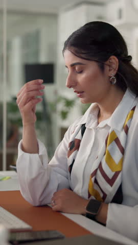 Business woman, headache and stress in office with burnout, audit migraine or fatigue. Accountant, employee overwhelmed and brain fog at desk with exhaustion, deadline pressure and eye strain