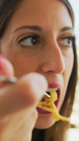 Spaghetti With Mussels And Clams Eaten By A Woman Having Lunch At The Resort 