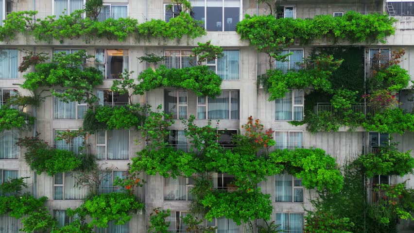 eco friendly green building with vertical garden, city harmony concept, sustainable futuristic architecture and urban nature balance, 4k