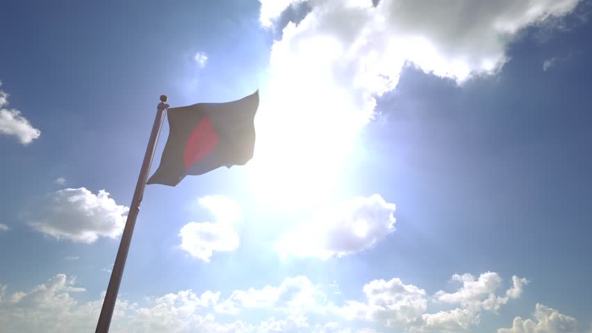 Bangladesh Flag waving on a Flagpole from a Moving Angle in front of a blue sky with clouds