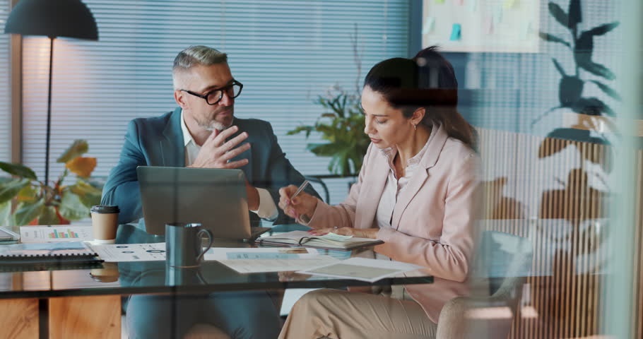 Office, document and business people with laptop for discussion, bookkeeping and audit report. Teamwork, mature accountant and auditor with digital for talking, financial research and review notes