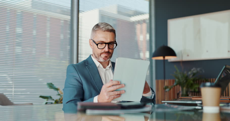 Business, man and reading on tablet in office for financial report, budget planning and information. Thinking, accountant and digital for problem solving, proposal ideas and decision for investment