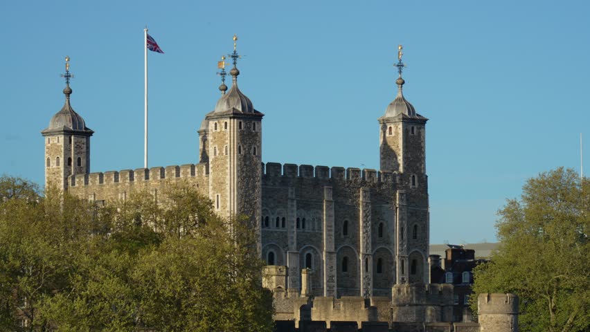Tower of london showing british flag waving in the wind