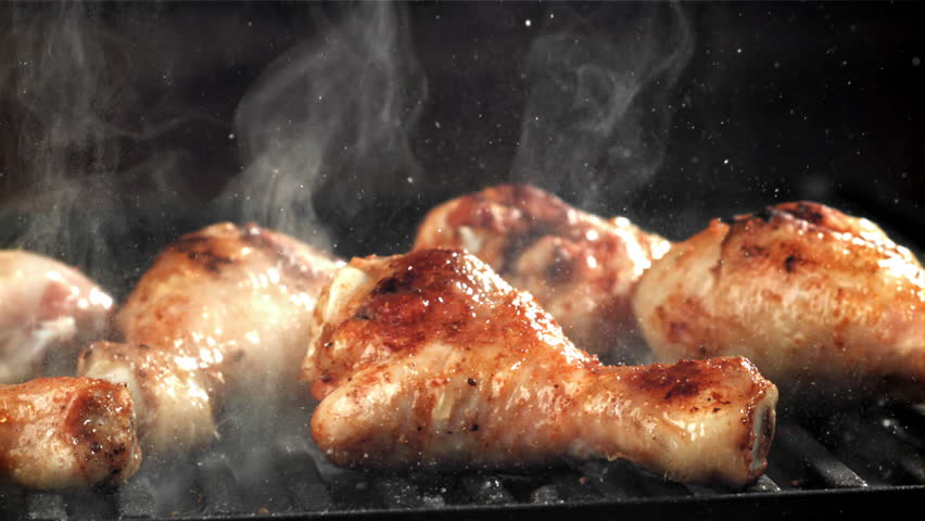 Chicken legs are fried in a pan. Filmed on a high-speed camera at 1000 fps. High quality FullHD footage