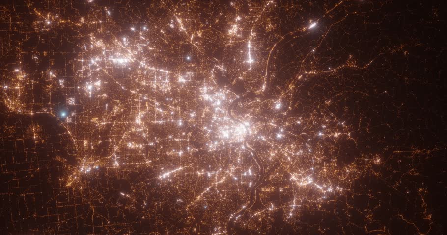 Cincinnati (Ohio, USA) aerial view at night. Top view on modern city with street lights. Camera is zooming out, rotating counterclockwise. Vertical video. The north is on the left side