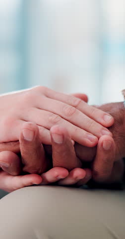 Senior patient, nurse and holding hands for empathy, elderly care or support in closeup of people. Old man, medical worker or person with compassion, trust and kindness in retirement home for healing